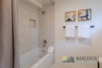 Tub/shower combo in hall bath. Shared between the king and queen bedrooms.